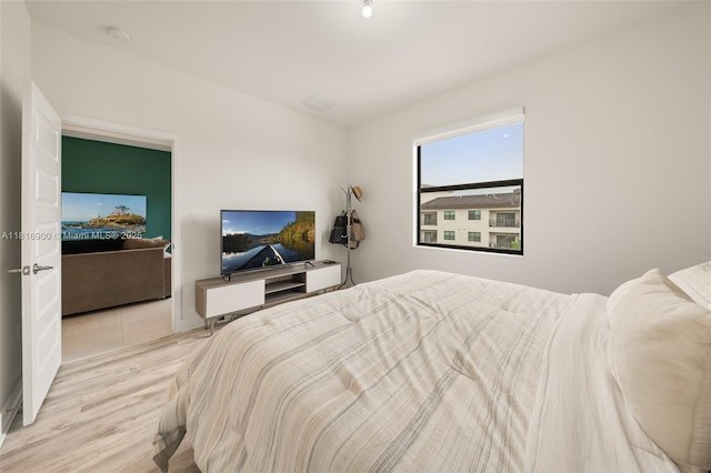 7905 NW 104th Ave Unit 34, Doral, FL 33178 - bedroom featuring wood finished floors