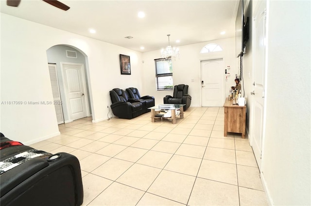 18972 SW 318th Ter, Homestead, FL 33030 - living area featuring recessed lighting, light tile patterned flooring, a ceiling fan, arched walkways, and a chandelier