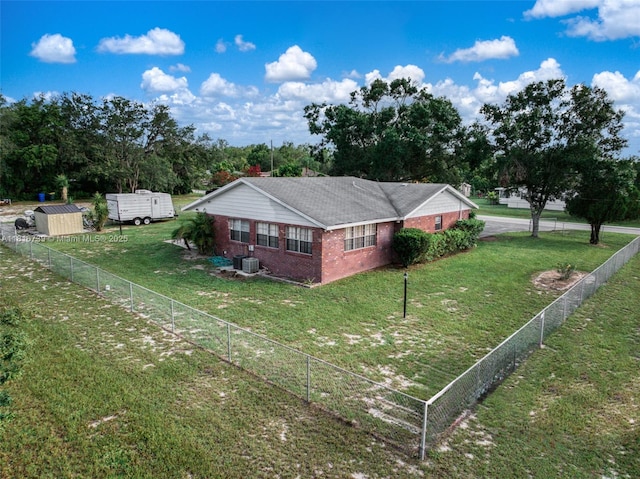 2430 N Dunwoodie Rd, Avon Park, FL 33825 - view of property exterior with brick siding, a fenced backyard, and view of scattered trees