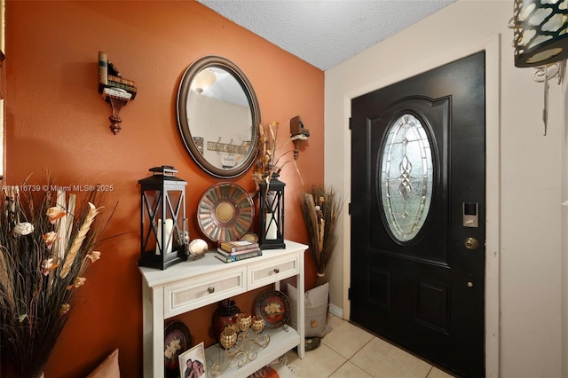 2430 N Dunwoodie Rd, Avon Park, FL 33825 - foyer featuring light tile patterned floors and a textured ceiling