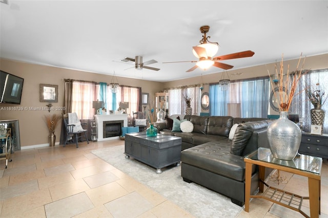 2430 N Dunwoodie Rd, Avon Park, FL 33825 - living room with a fireplace and ceiling fan