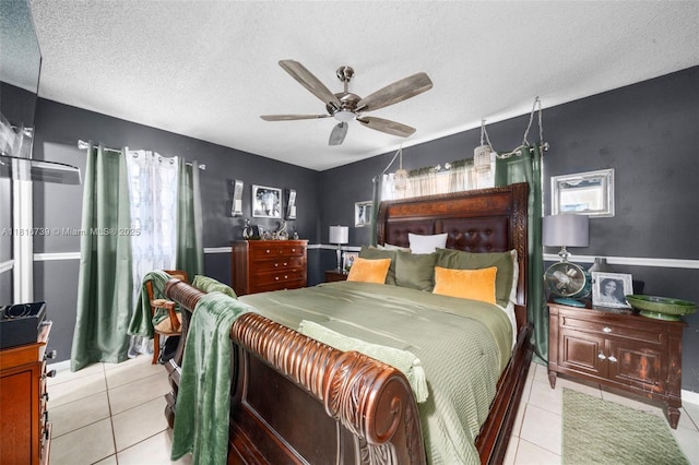 2430 N Dunwoodie Rd, Avon Park, FL 33825 - bedroom with light tile patterned floors, a textured ceiling, and ceiling fan
