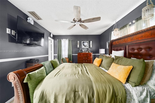 2430 N Dunwoodie Rd, Avon Park, FL 33825 - bedroom featuring a textured ceiling and ceiling fan