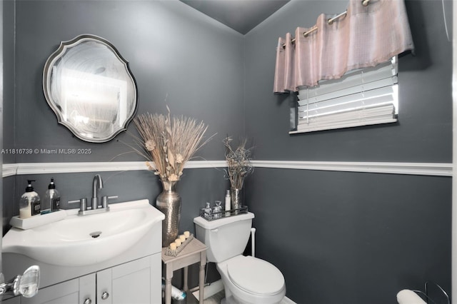 2430 N Dunwoodie Rd, Avon Park, FL 33825 - bathroom with toilet and vanity