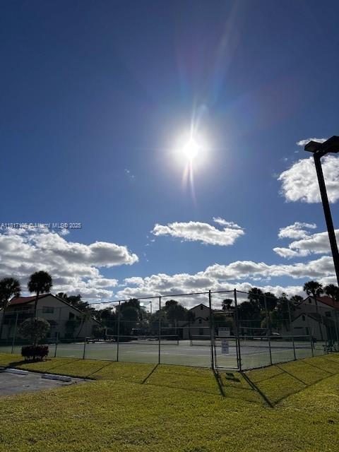 12 Via De Casas Sur Unit 104, Boynton Beach, FL 33426 - view of tennis court