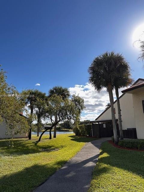 12 Via De Casas Sur Unit 104, Boynton Beach, FL 33426 - view of home's community featuring a yard