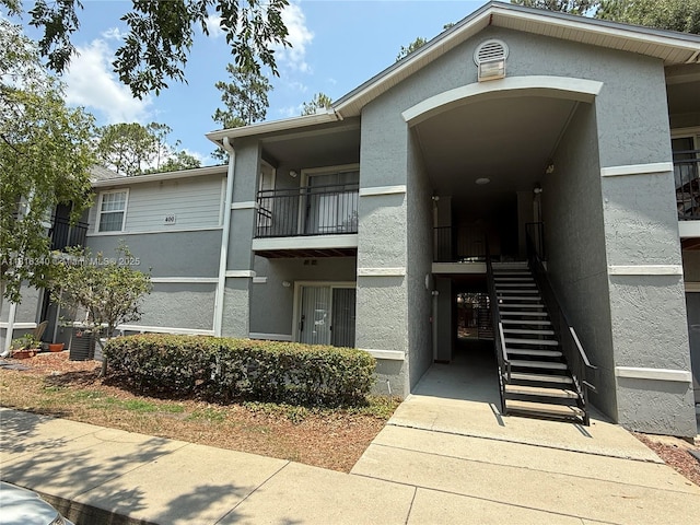 3705SW 27 Th St Unit 416, Gainesville, FL 32608 - view of property featuring stairs