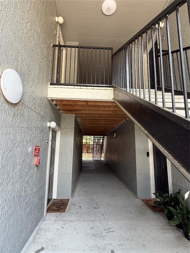 3705SW 27 Th St Unit 416, Gainesville, FL 32608 - view of parking featuring an exterior structure
