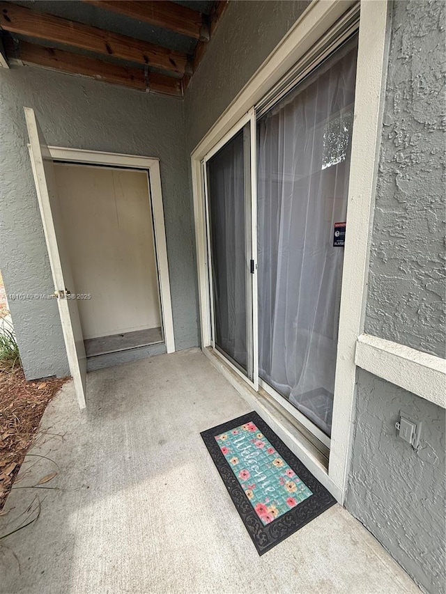 3705SW 27 Th St Unit 416, Gainesville, FL 32608 - entrance to property with stucco siding and crawl space