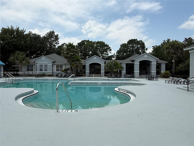 3705SW 27 Th St Unit 416, Gainesville, FL 32608 - community pool featuring a patio area