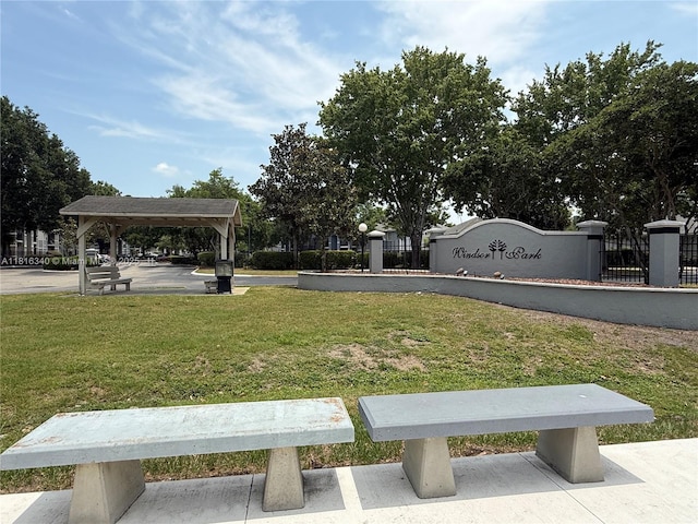 3705SW 27 Th St Unit 416, Gainesville, FL 32608 - surrounding community featuring a lawn and a gazebo