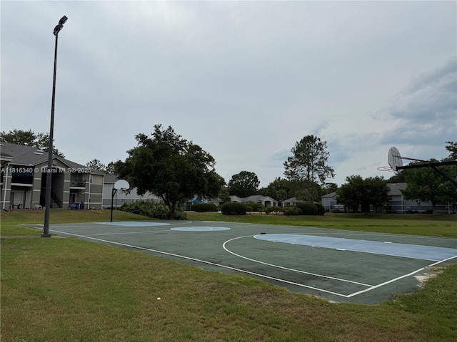 3705SW 27 Th St Unit 416, Gainesville, FL 32608 - view of basketball court featuring community basketball court and a yard