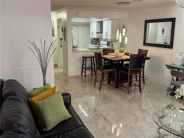 6560 SW 138th Ct Unit 804, Miami, FL 33183 - dining space featuring crown molding and light marble finish floors