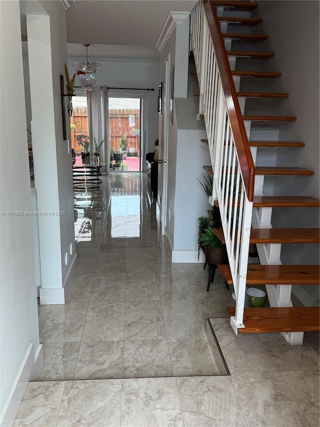 6560 SW 138th Ct Unit 804, Miami, FL 33183 - stairway featuring a chandelier and marble finish floors