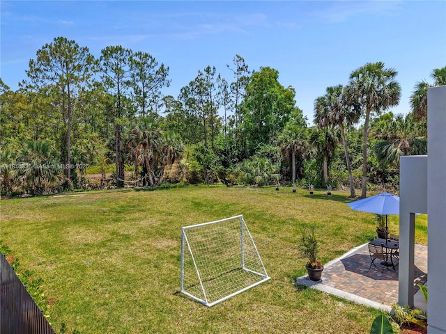 1902 Della Dr, Naples, FL 34117 - view of yard with an area for sports and a patio