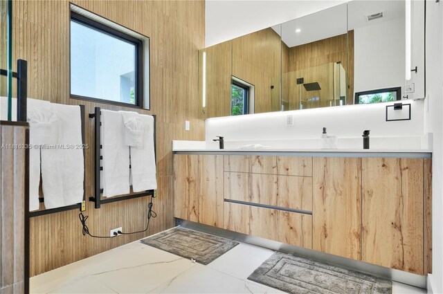 1902 Della Dr, Naples, FL 34117 - bathroom featuring healthy amount of natural light and double vanity