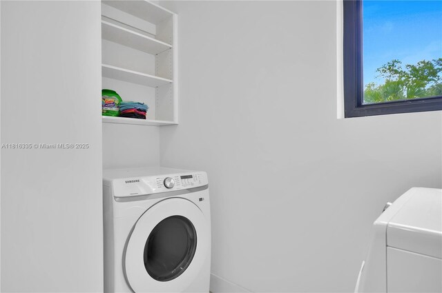 1902 Della Dr, Naples, FL 34117 - laundry area with washer / clothes dryer