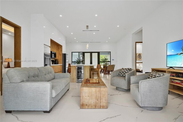 1902 Della Dr, Naples, FL 34117 - living room featuring wine cooler and recessed lighting