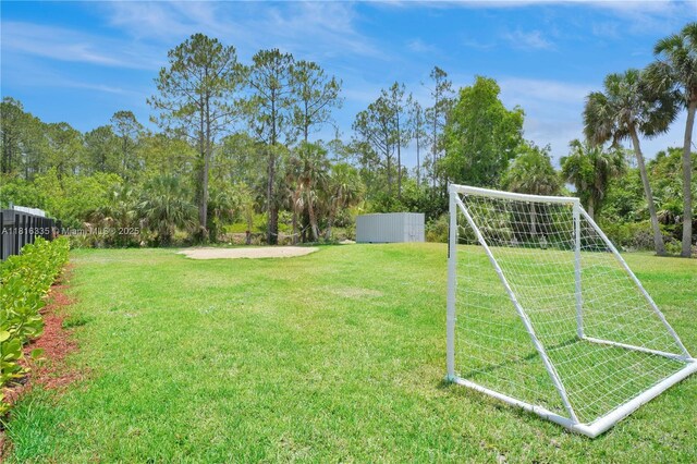 1902 Della Dr, Naples, FL 34117 - view of yard with an area for sports