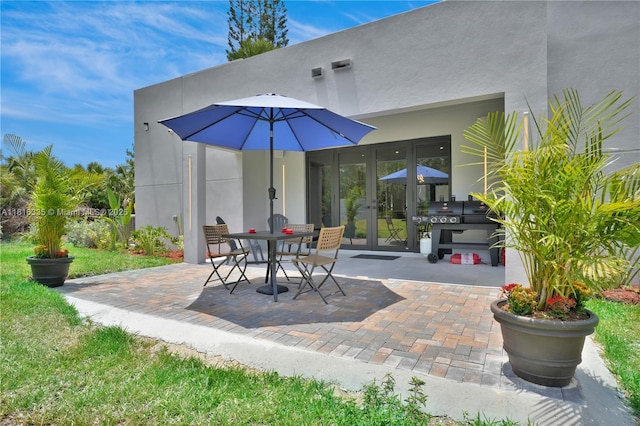1902 Della Dr, Naples, FL 34117 - view of patio / terrace with french doors and a grill