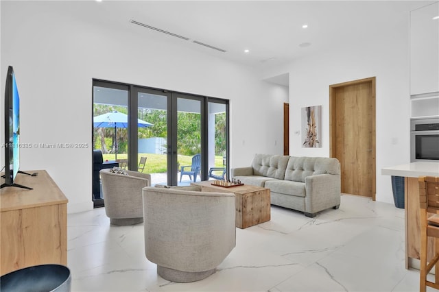1902 Della Dr, Naples, FL 34117 - living room with light marble finish flooring and recessed lighting