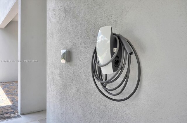 1902 Della Dr, Naples, FL 34117 - exterior view of electric vehicle charger
