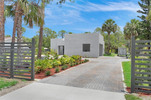 1902 Della Dr, Naples, FL 34117 - view of front of property with stucco siding