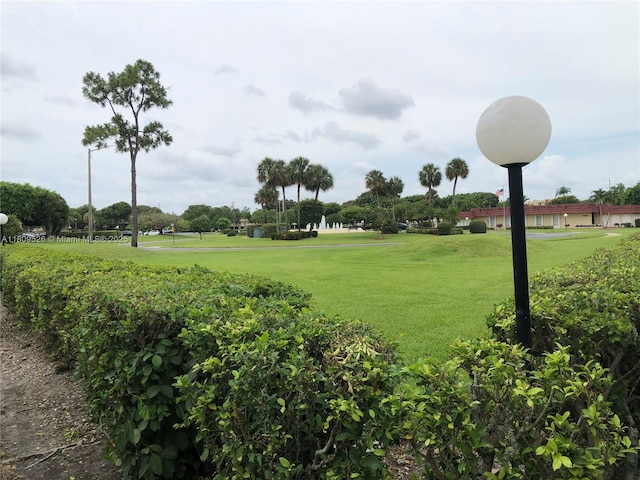 23277 N Barwood Ln N Unit 205, Boca Raton, FL 33428 - view of community with a lawn