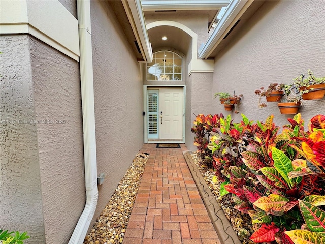 1136 SE Westminster Pl, Stuart, FL 34997 - view of exterior entry featuring stucco siding