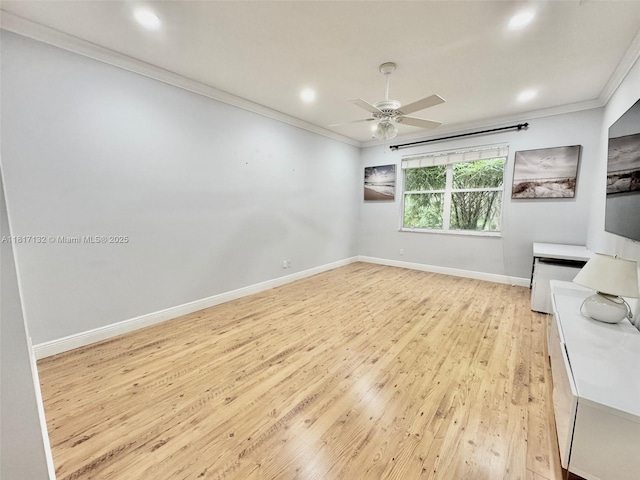 1136 SE Westminster Pl, Stuart, FL 34997 - spare room featuring ceiling fan, crown molding, light wood-style floors, baseboards, and recessed lighting