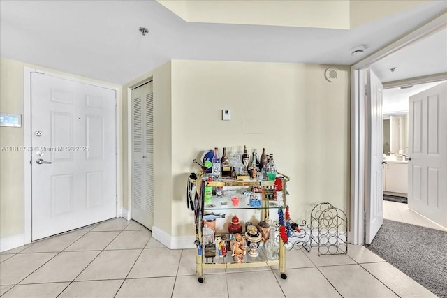 2351 Douglas Rd Unit 1204, Miami, FL 33145 - foyer entrance featuring tile patterned floors and baseboards