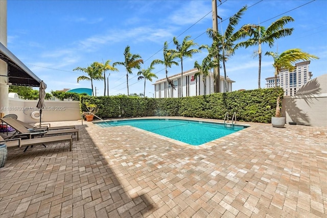 2351 Douglas Rd Unit 1204, Miami, FL 33145 - community pool featuring a patio