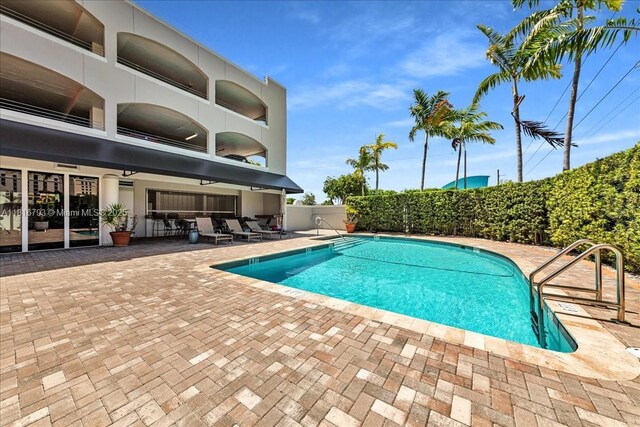 2351 Douglas Rd Unit 1204, Miami, FL 33145 - view of swimming pool with a patio area