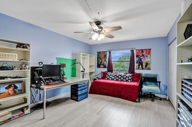 6555 W Broward Blvd Unit 412, Plantation, FL 33317 - office with a ceiling fan, wood finished floors, and baseboards