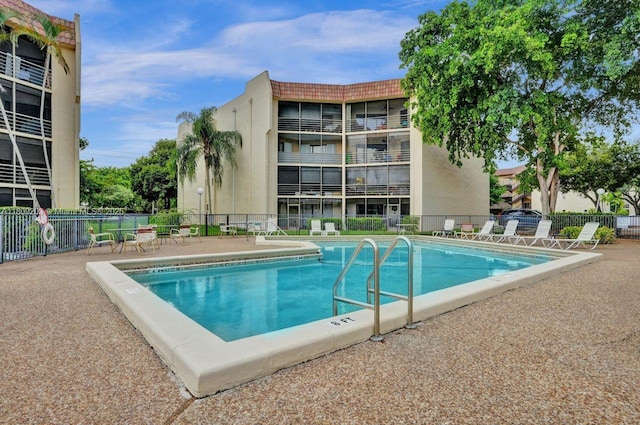 6555 W Broward Blvd Unit 412, Plantation, FL 33317 - community pool featuring a patio area