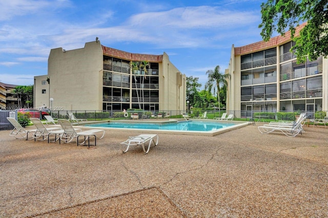 6555 W Broward Blvd Unit 412, Plantation, FL 33317 - community pool featuring a patio area