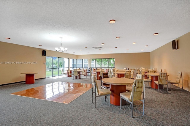 6555 W Broward Blvd Unit 412, Plantation, FL 33317 - carpeted dining room with healthy amount of natural light, a chandelier, and a textured ceiling