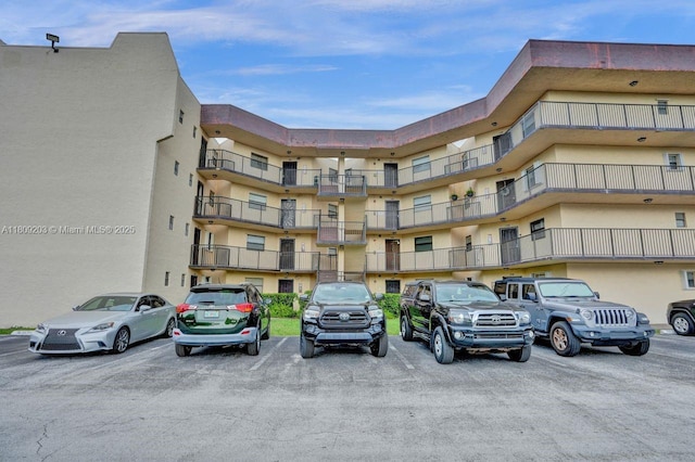6555 W Broward Blvd Unit 412, Plantation, FL 33317 - view of apartment building / complex with uncovered parking