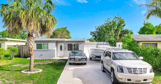 6336 SW 22nd St, Miramar, FL 33023 - ranch-style house featuring driveway and stucco siding