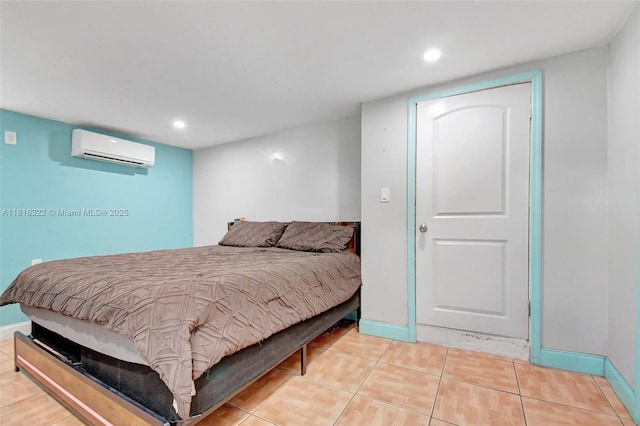 6336 SW 22nd St, Miramar, FL 33023 - bedroom featuring a wall mounted AC, recessed lighting, baseboards, and tile patterned floors