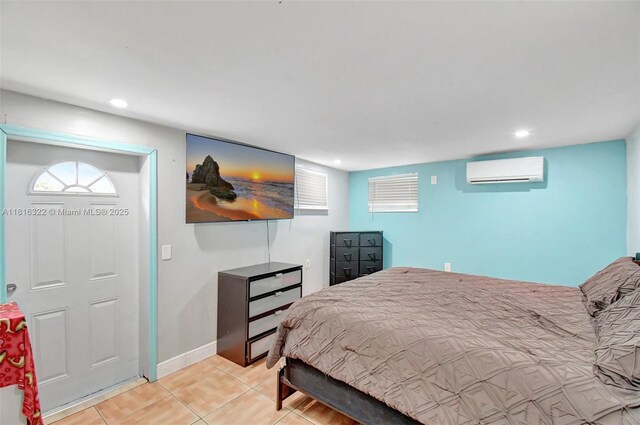 6336 SW 22nd St, Miramar, FL 33023 - bedroom featuring an AC wall unit, light tile patterned floors, recessed lighting, and baseboards