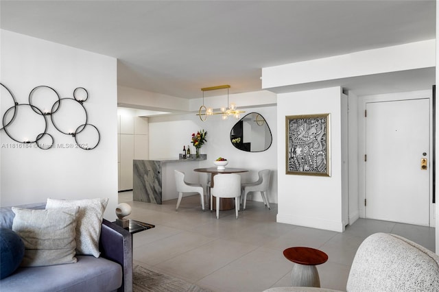 4000 Towerside Ter Unit 804, Miami, FL 33138 - living area featuring tile patterned flooring and a chandelier
