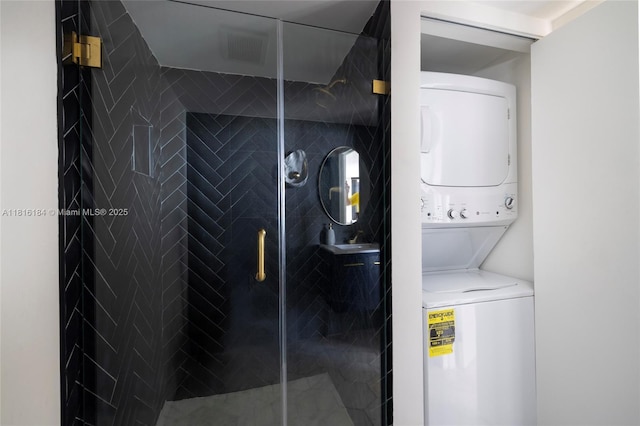 4000 Towerside Ter Unit 804, Miami, FL 33138 - washroom featuring stacked washer / drying machine