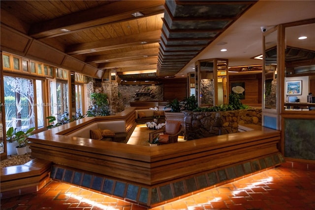 4000 Towerside Ter Unit 804, Miami, FL 33138 - building lobby with a security system, a wooden ceiling with exposed beams, and recessed lighting