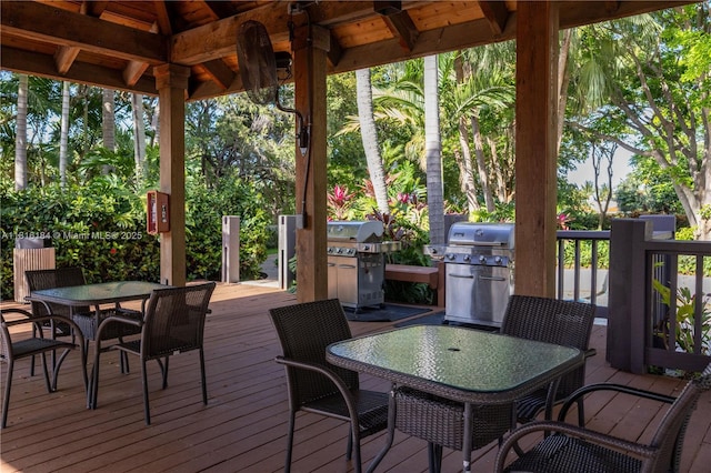 4000 Towerside Ter Unit 804, Miami, FL 33138 - wooden deck with outdoor dining area and a grill