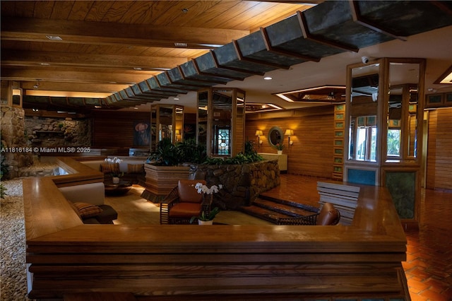 4000 Towerside Ter Unit 804, Miami, FL 33138 - common area with a wooden ceiling with exposed beams, wooden walls, and a surveillance system