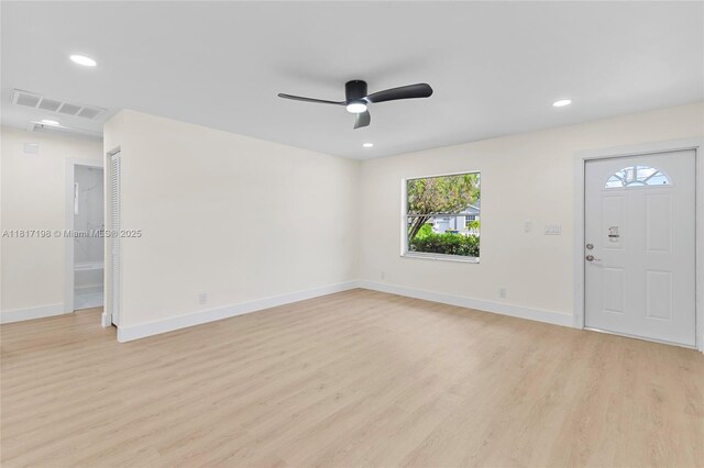 8510 SE Citrus Way, Hobe Sound, FL 33455 - entrance foyer with light wood finished floors, a ceiling fan, healthy amount of natural light, and recessed lighting