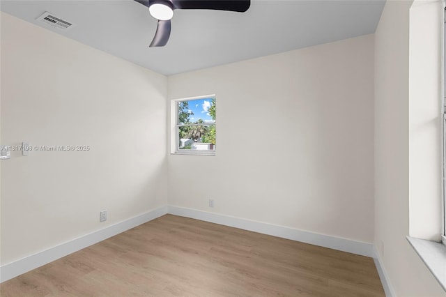 8510 SE Citrus Way, Hobe Sound, FL 33455 - unfurnished room featuring a ceiling fan, light wood-style flooring, and baseboards