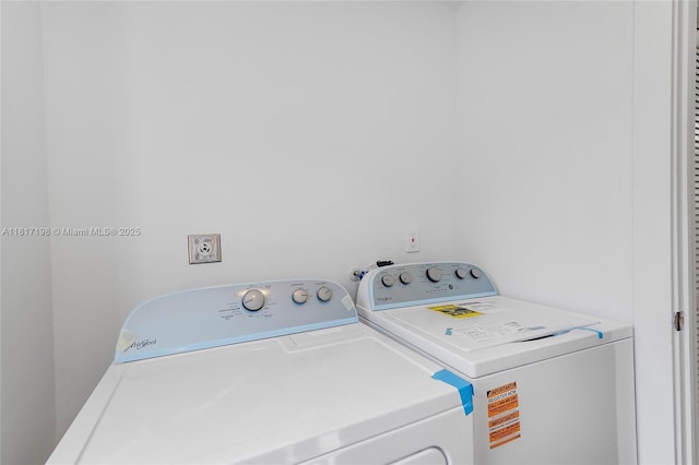 8510 SE Citrus Way, Hobe Sound, FL 33455 - laundry area with washing machine and clothes dryer