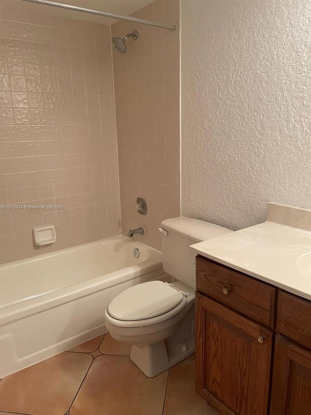 6575 W Oakland Park Blvd Unit 511, Lauderhill, FL 33313 - bathroom with vanity, toilet, a textured wall, bathtub / shower combination, and tile patterned flooring